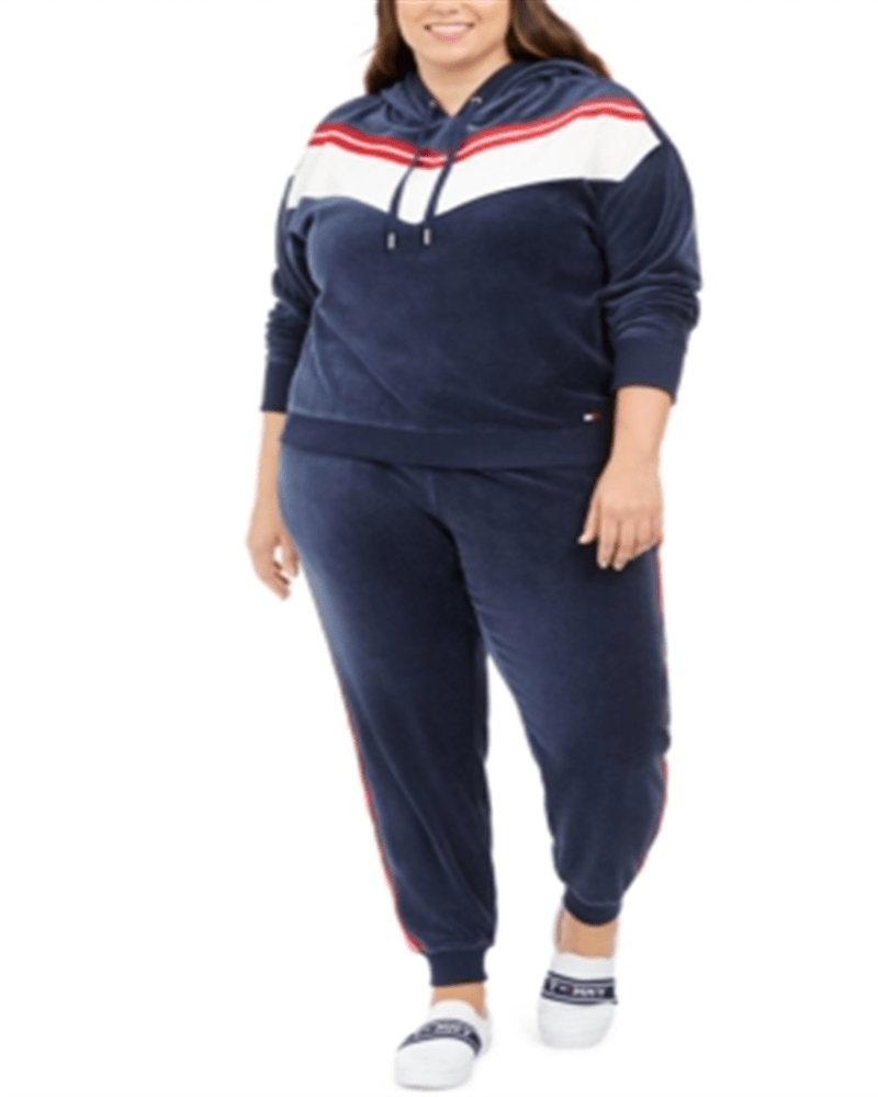 Front of a model wearing a size 0X Tommy Hilfiger Women's Sport Plus Chevron Velour Hooded Sweatshirt Navy Size 0X in Blue by Tommy Hilfiger. | dia_product_style_image_id:313780